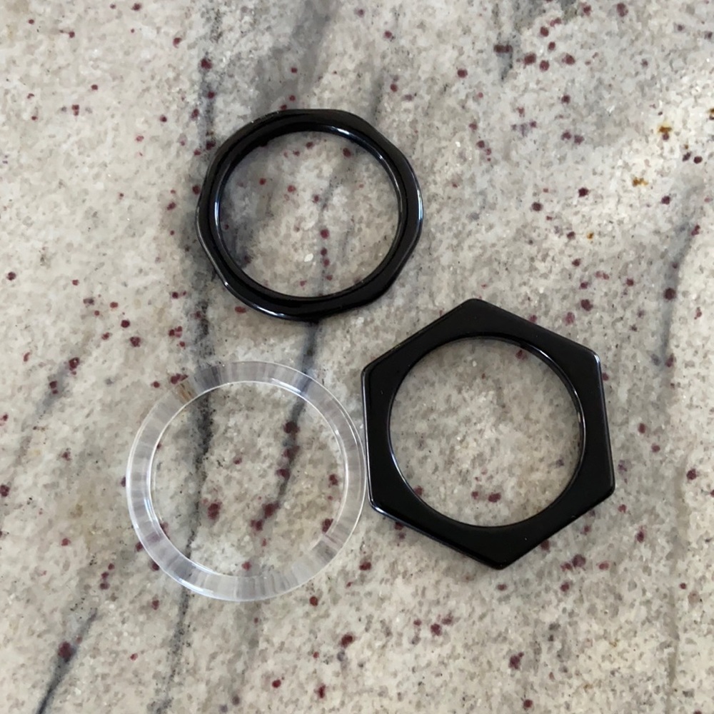 Three plastic bangles set with storage pouch